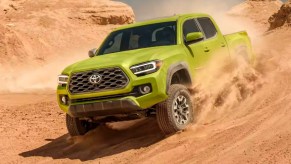 The 2023 Toyota Tacoma racing through sand