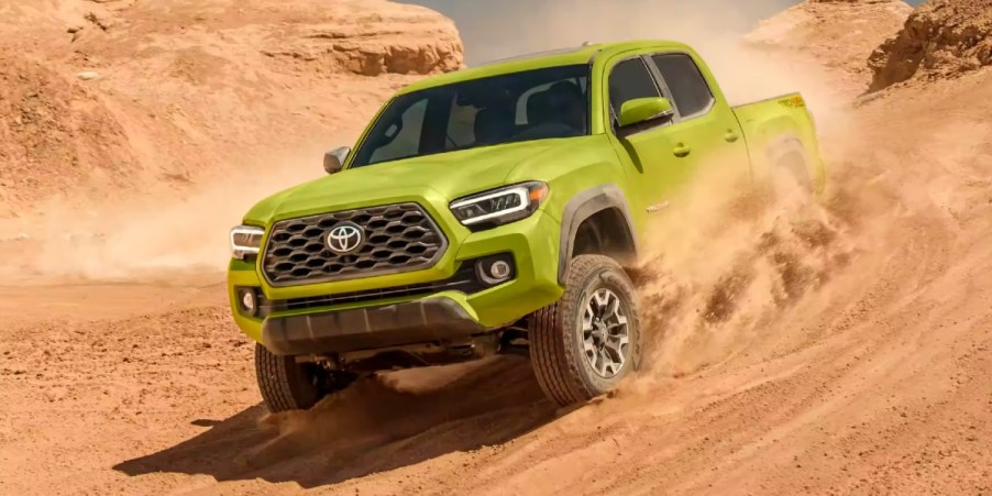 The 2023 Toyota Tacoma racing through sand