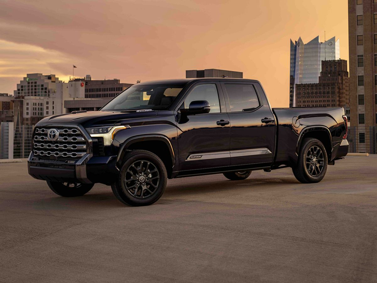 The 2023 Toyota Tundra parked in the city at dusk.