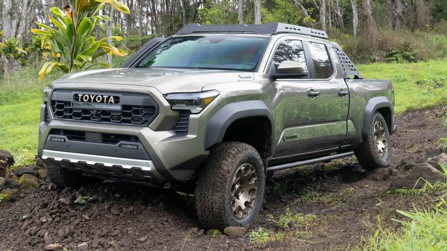 The 2024 Toyota Tacoma Trailhunter off-roading in mud