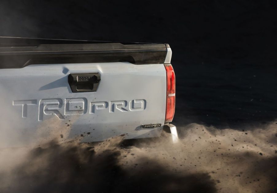 2024 Toyota Tacoma Hybrid teaser showing only a bit of the tailgate