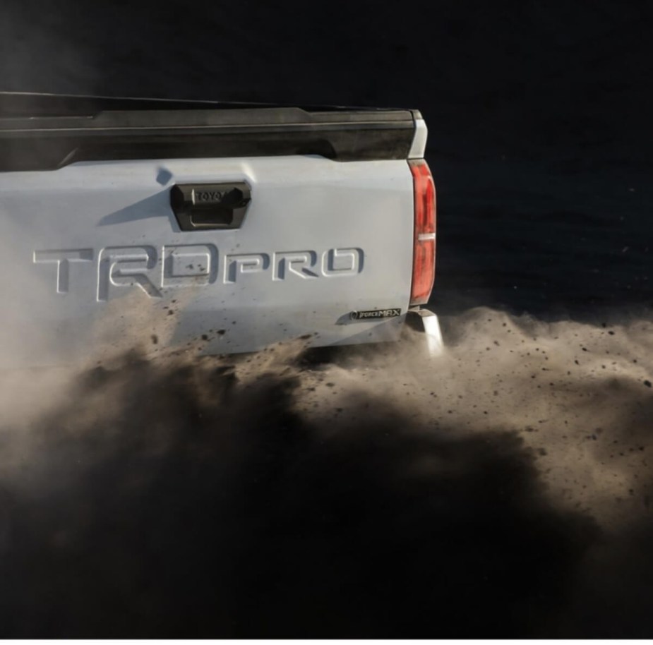 The tailgate of the redesigned Toyota Tacoma showing hybrid badging.