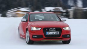 An Audi S4 drifting in the snow