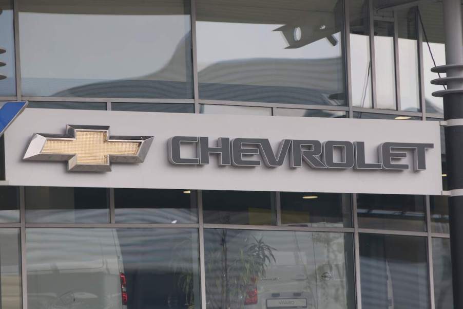 A Chevrolet logo on the side of a building.