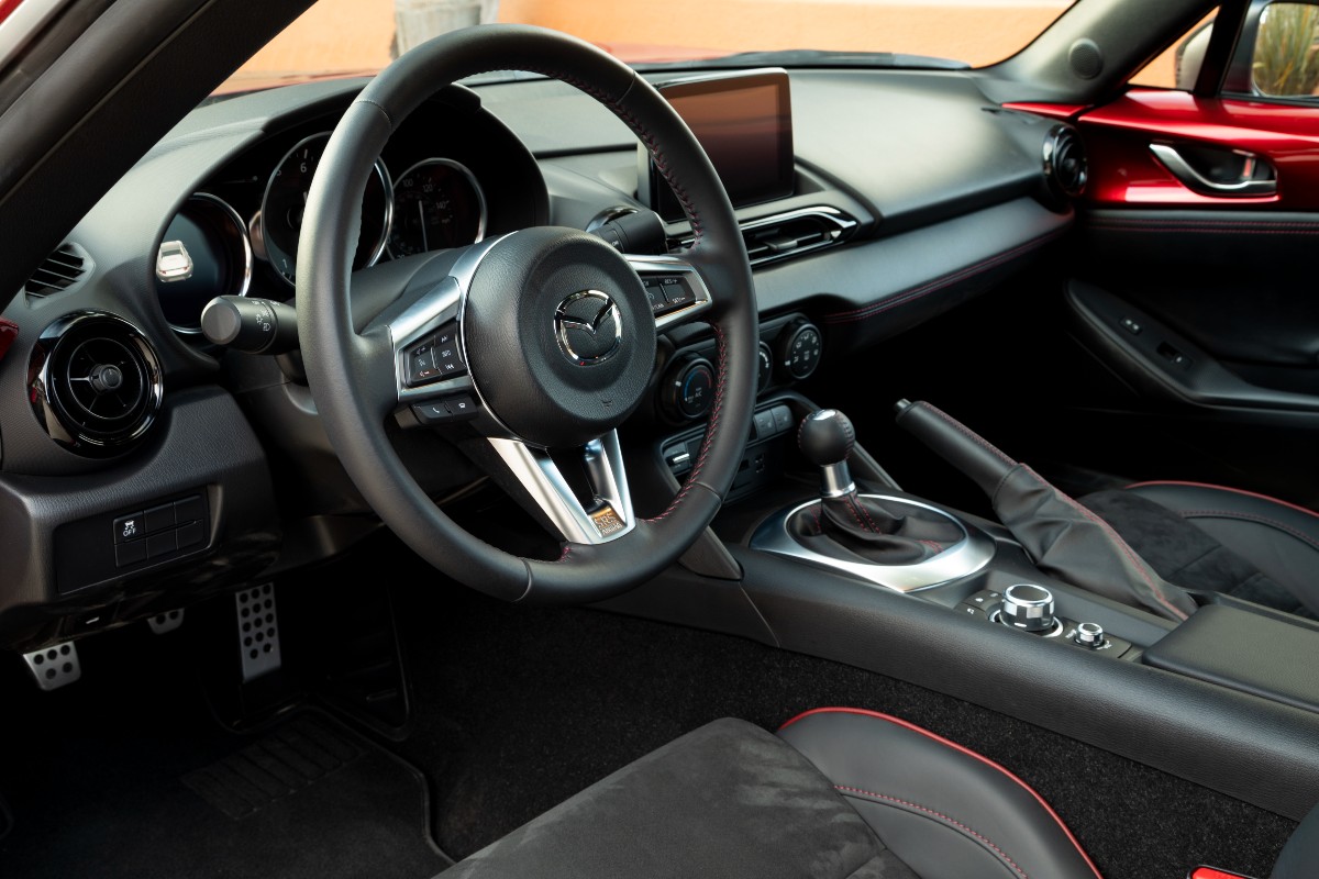 Dashboard in 2023 Mazda MX-5 Miata sports car, most reliable Mazda car, says Consumer Reports, not Mazda3 or CX-5