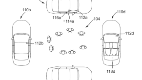 The patent diagram for Ford's new Multi-Vehicle Audio System shows four vehicles parked around a party.