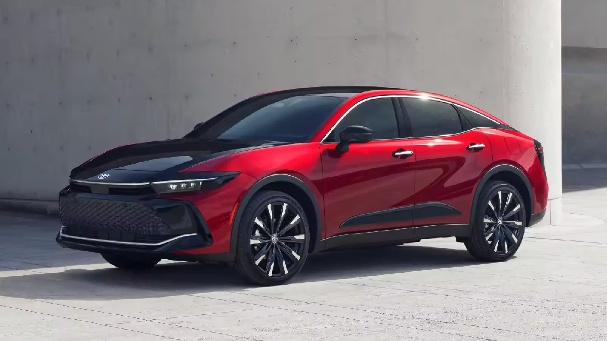 Front angle view of black and red 2023 Toyota Crown midsize sedan