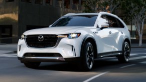 Front angle view of white 2024 Mazda CX-90 midsize SUV