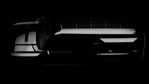 Teaser image of the new mysterious GMC Hummer EV Pickup upfitted by EarthCruiser for overlanding