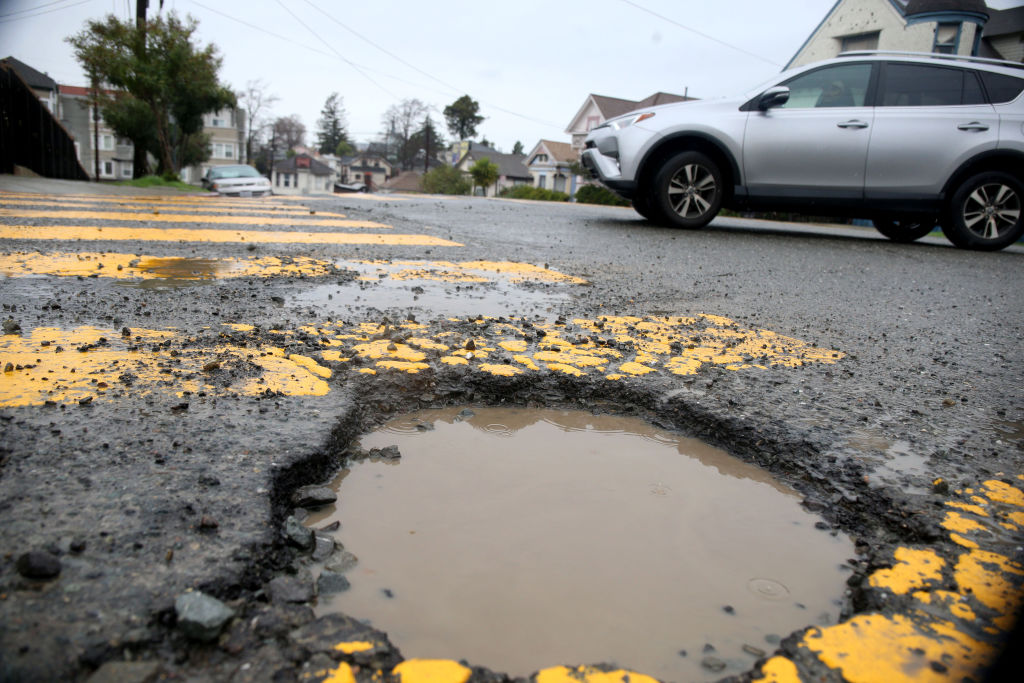 A large pothole filled with mud in San Francisco