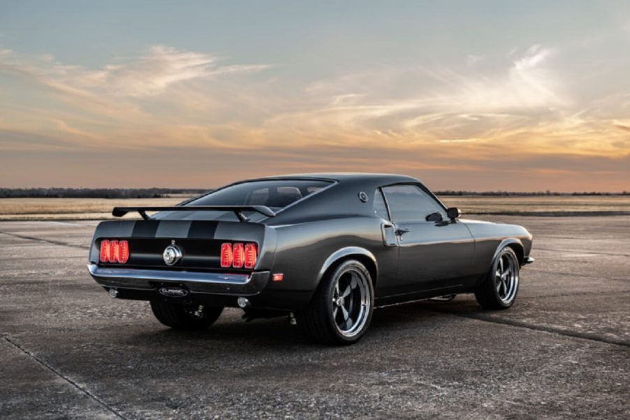 A gray and black 1969 Ford Mustang "Hitman" shows off its Boss 429 and Mach 1-inspired rear-end was featured in the Keanu Reeves 'John Wick' franchise.