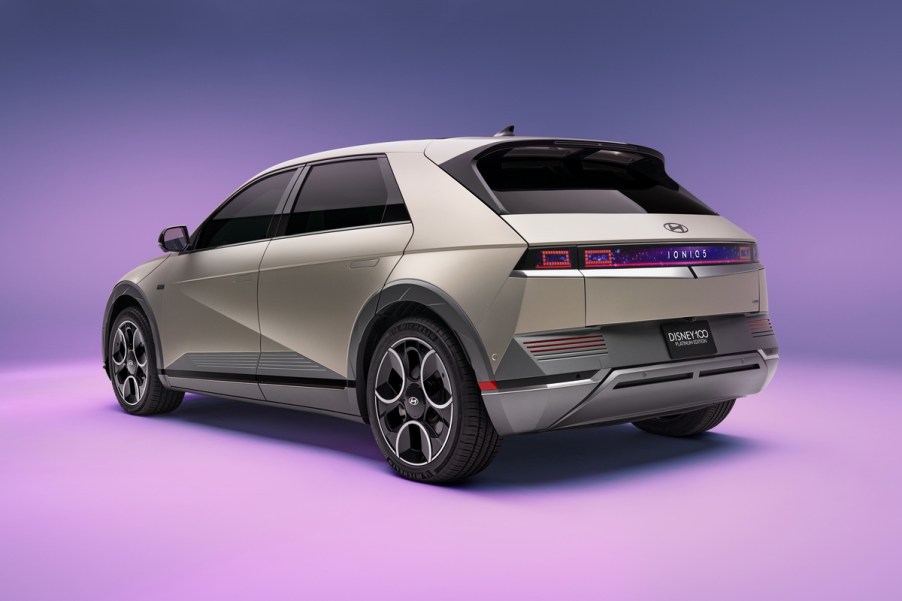 A Hyundai Ioniq 5 Disney 100 Platinum edition on a light purple background.