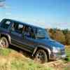 The second-generation Isuzu Trooper drives off-road.