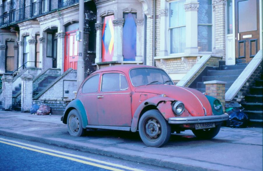 An old and rusted Volkswagen Beetle