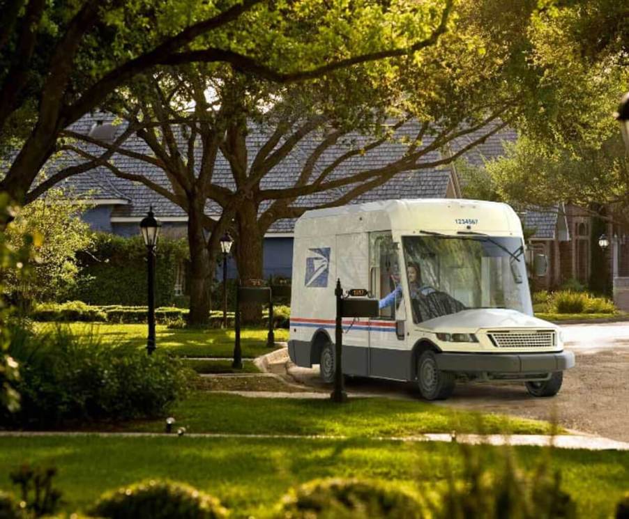 An Oshkosh NGDV mail truck delivers some mail.