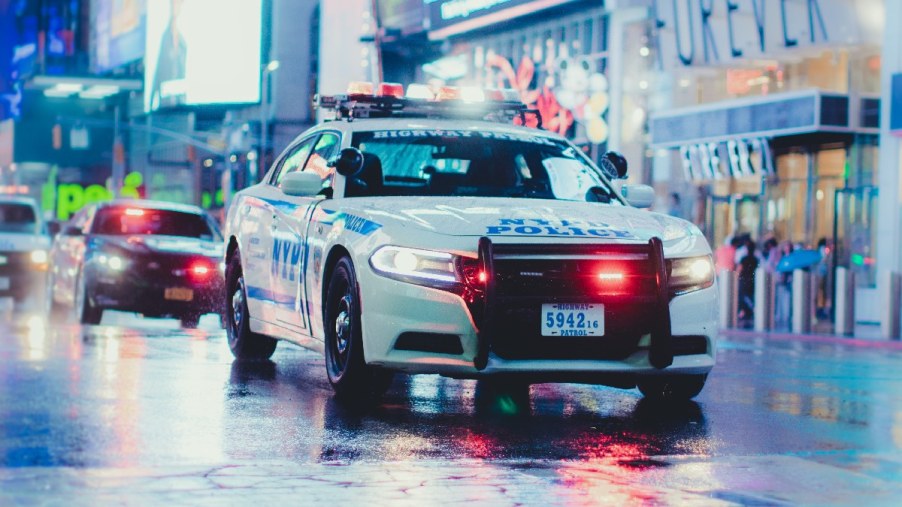 Patrol vehicle on the street, highlighting why cops always leave a police car idling