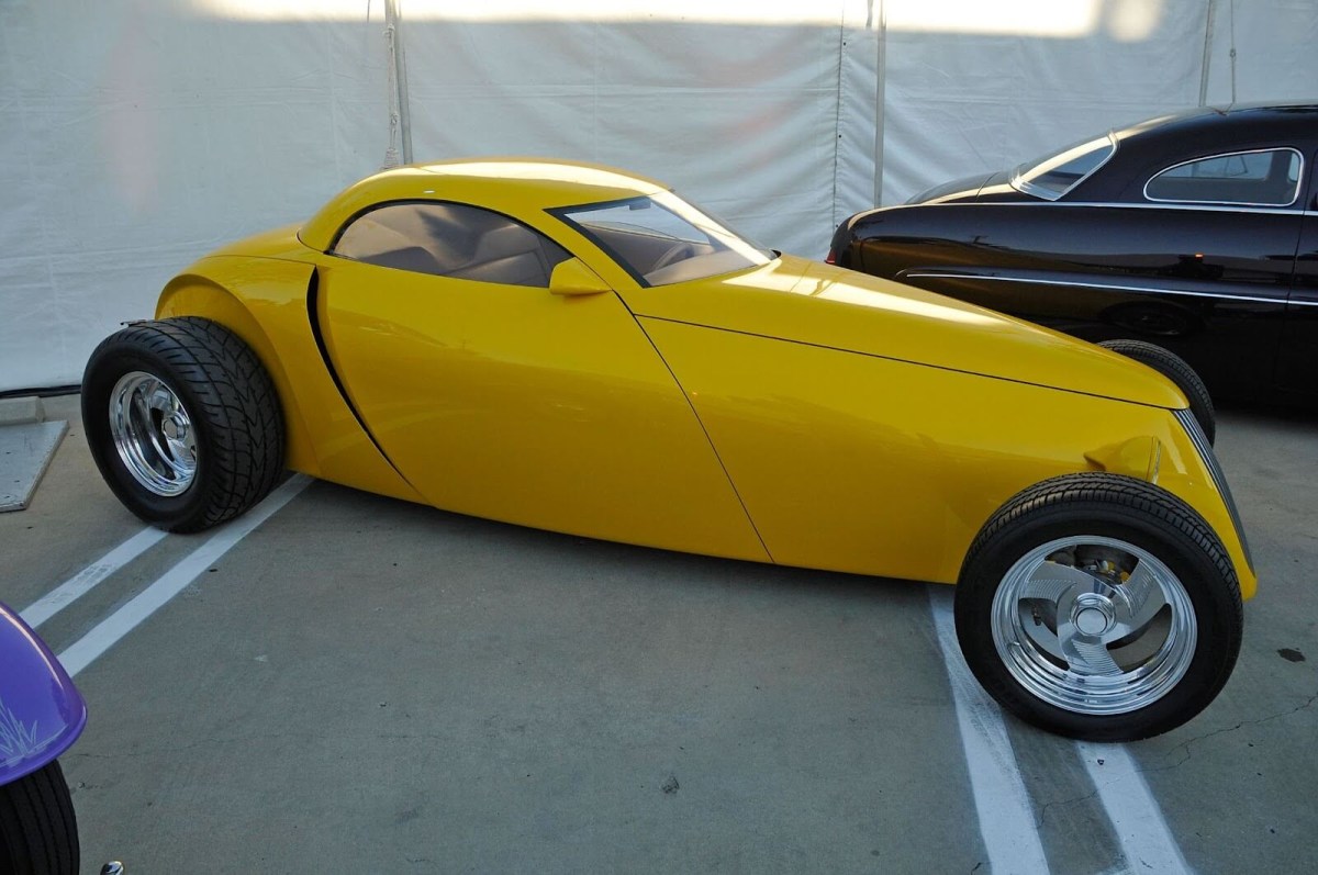 A hot rod on custom wheels