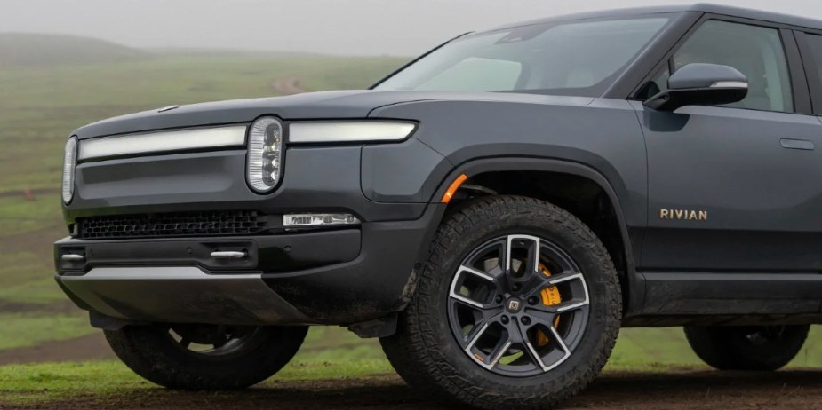 The front of a gray 2023 Rivian R1S fully-electric SUV. 