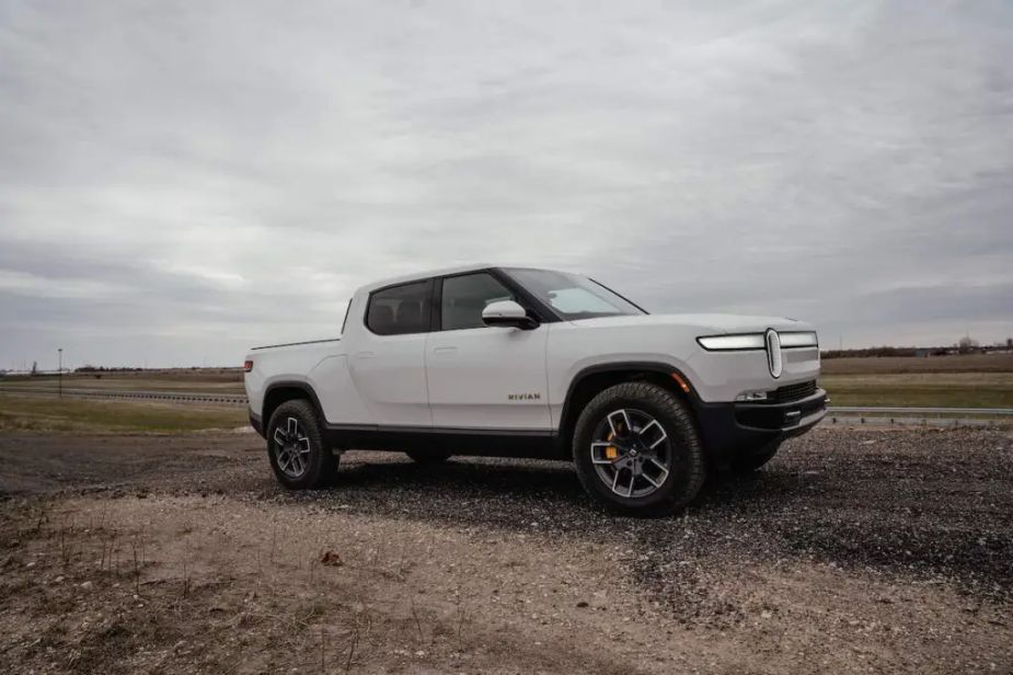 Rivian R1T parked in the dirt