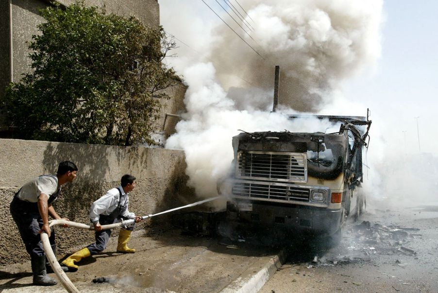 Guys putting truck fire out.