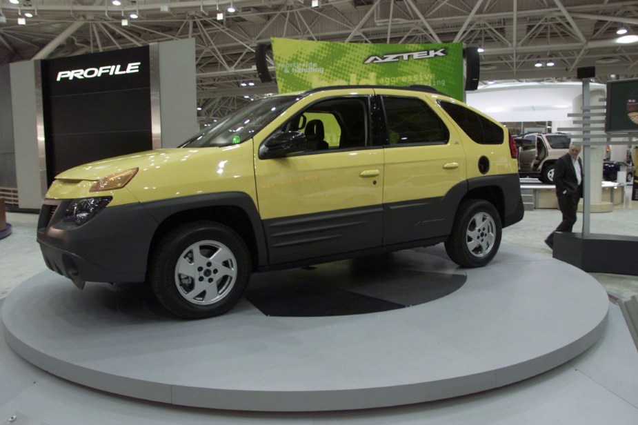 Yellow Pontiac Aztek 