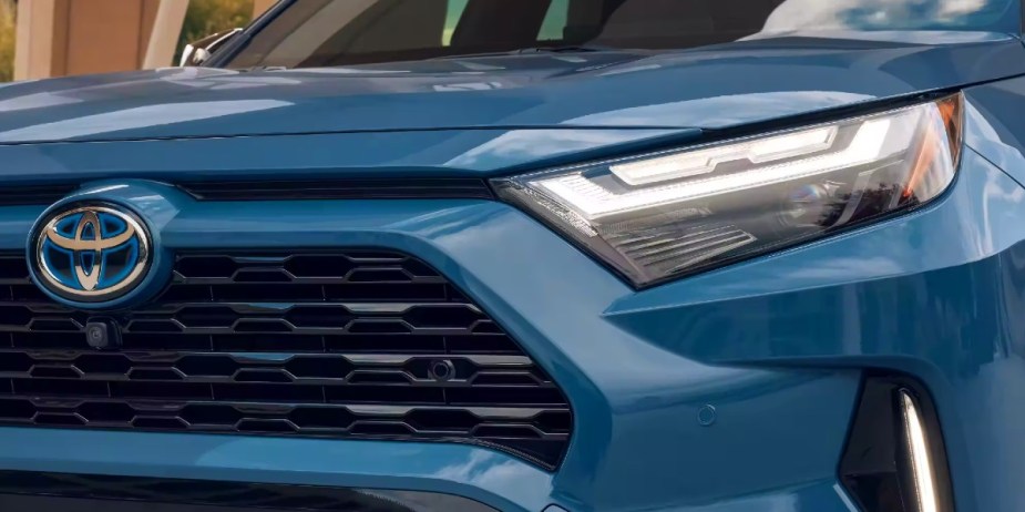 The front of a blue 2023 Toyota RAV4 Hybrid small hybrid SUV.