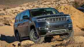 The best 4x4 SUVs includes this Jeep Wagoneer in the dirt