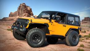 The two-door Jeep Orange Peelz concept model parked on desert stone