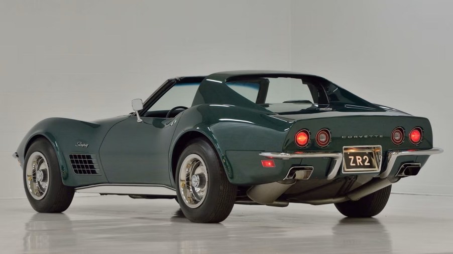 A classic 1971 Chevrolet Corvette ZR2 in Brands Hatch Green parks in a studio.