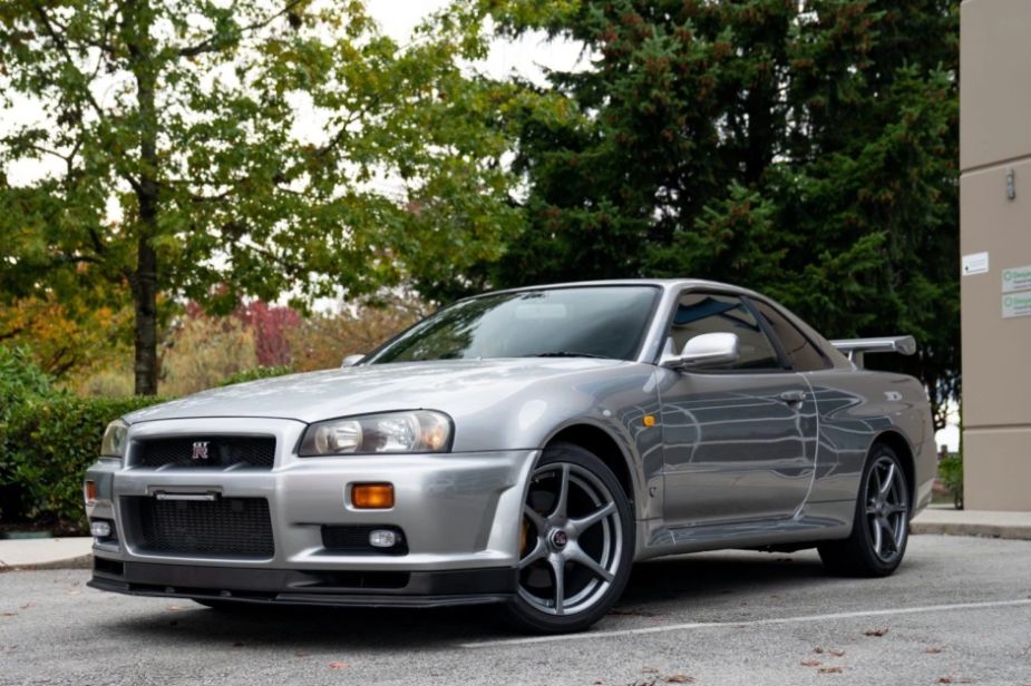 A silver 1999 Skyline GTR parked