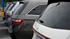 A 2013 Honda Odyssey lineup at a dealership