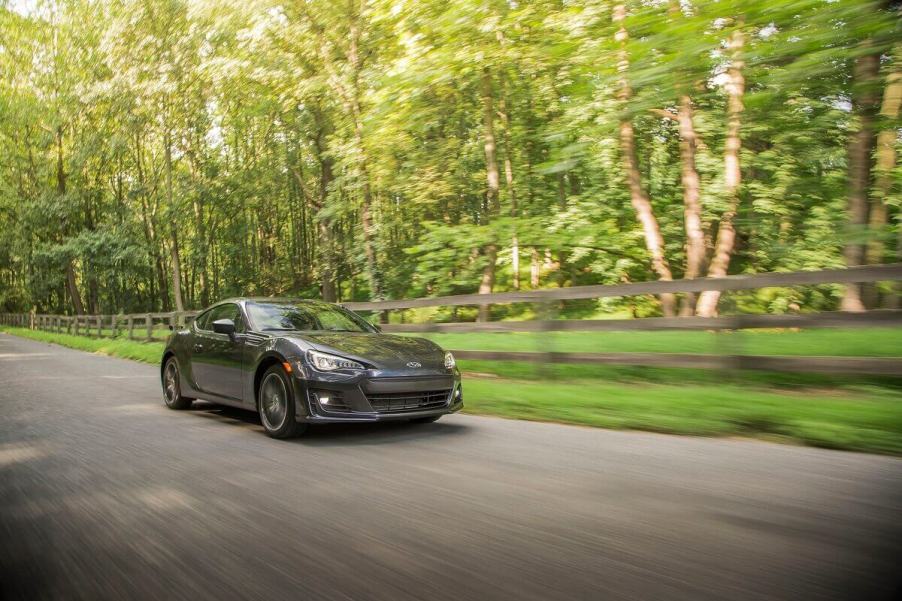 A dark 2019 Subaru BRZ sports car shows off its simplicity and quickness among the cheapest performance cars.