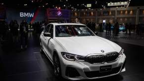 Attainable luxury car: A BMW M340i xDrive sedan on display at the 2021 Bangkok International Motor Show