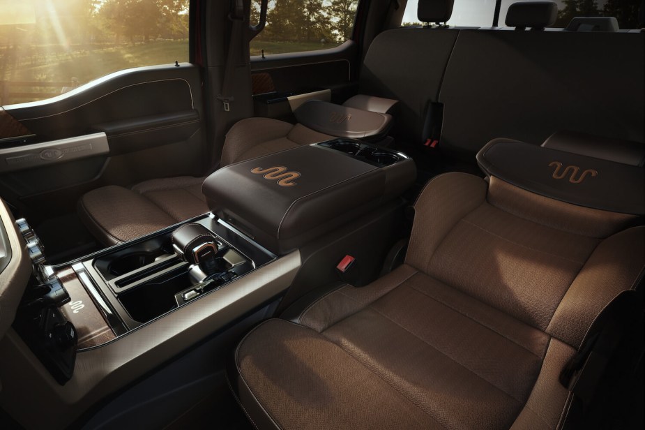 The fold-flat front seats in a new Ford F-150 pickup truck crew cab.