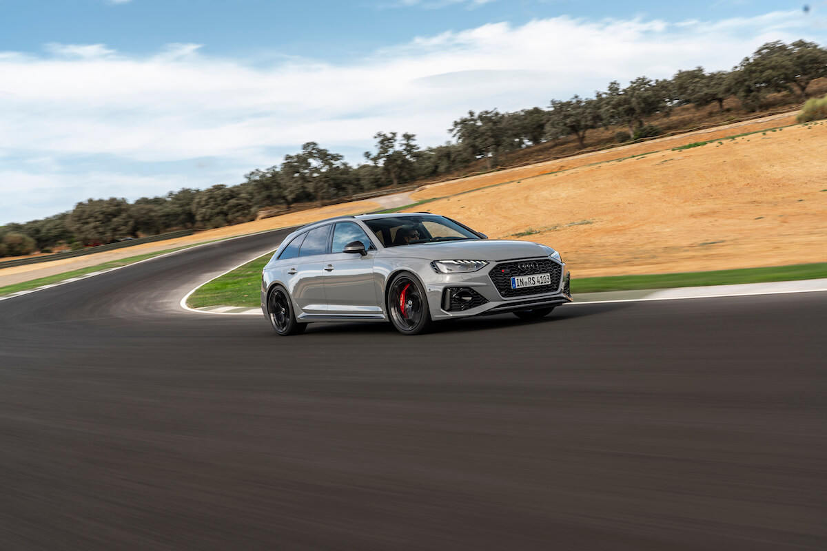 A Nardo Gray 2023 Audi RS4 Avant driving on a track