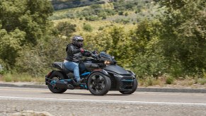 The 2023 Cam-Am Spyder motorcycle on the road