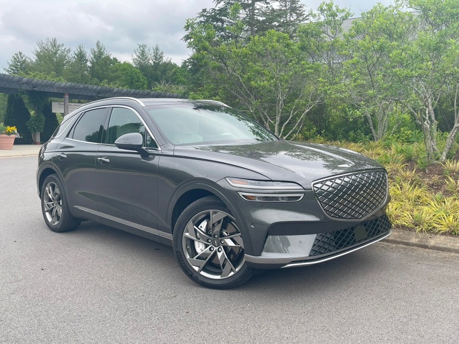 The 2023 Genesis Electrifed GV70 parked near plants