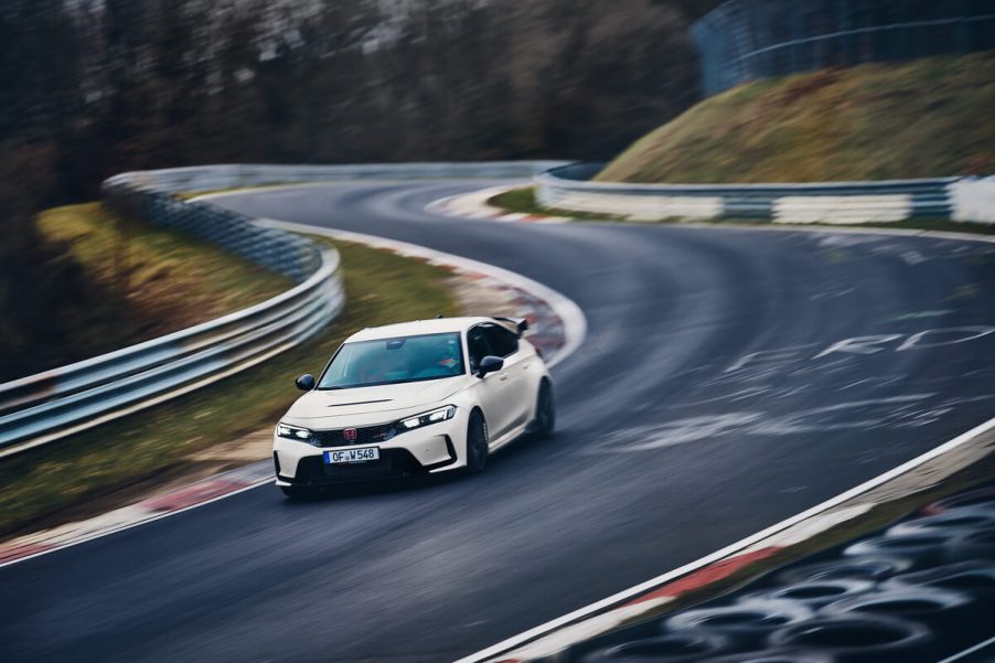 A front view of the 2023 Honda Civic Type R on a race track.