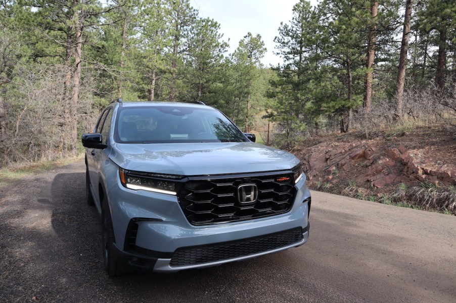 2023 Honda Pilot TrailSport front view on the trail