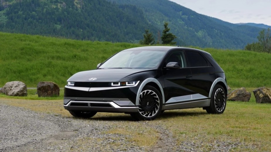 Black and Silver 2023 Hyundai Ioniq 5 Electric SUV parked in a field