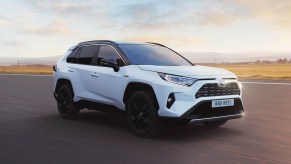 The 2023 Toyota RAV4 driving on the road