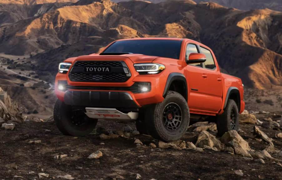 The 2023 Toyota Tacoma off-roading over rocky terrain