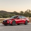 A red 2023 Infiniti Q50S parked on the road