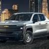 The 2024 Chevy Silverado EV WT at a contrustion site at night