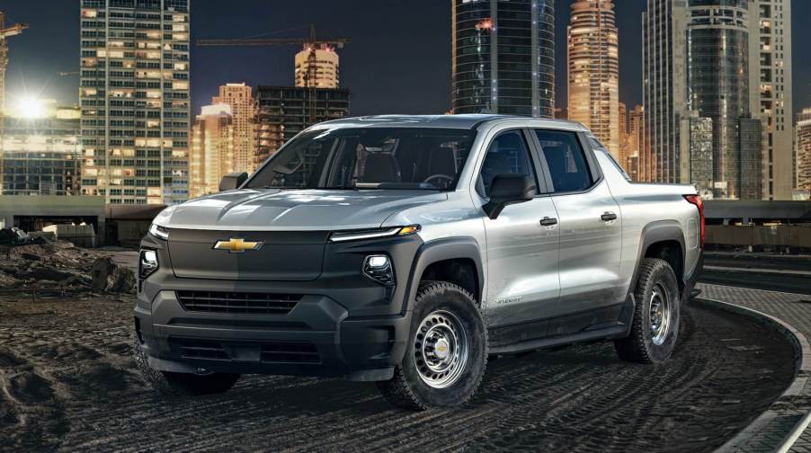 The 2024 Chevy Silverado EV WT at a contrustion site at night