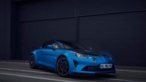 A blue Alpine A110 R parked on track