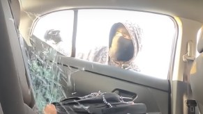 San Francisco car thief breaking into vehicle, showing how he’s stopped by glitter bombs and fart spray in YouTube video