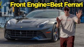 Braden Carlson from MotorBiscuit standing with a front-engine Ferrari F12 Berlinetta