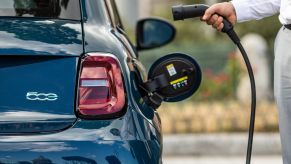 A 2024 Fiat 500e being plugged in