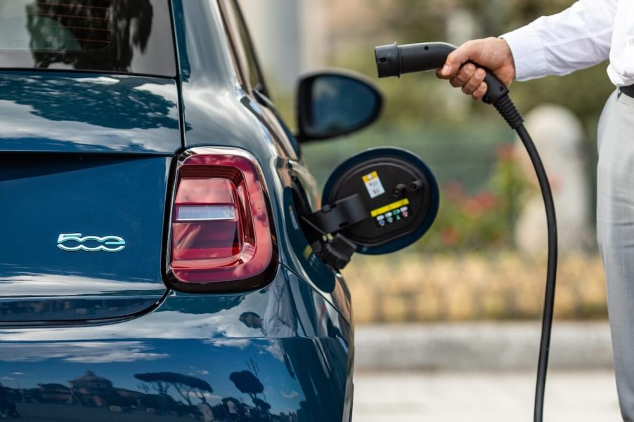 A 2024 Fiat 500e being plugged in